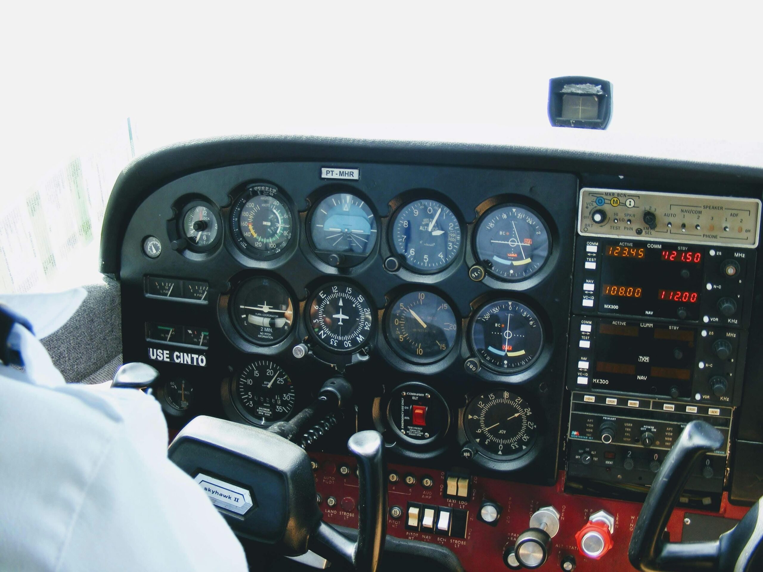 Detailed view of an aircraft cockpit showcasing various control meters and technology.